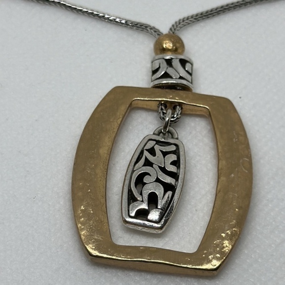 Elegant Gold and Silver Pendant Necklace